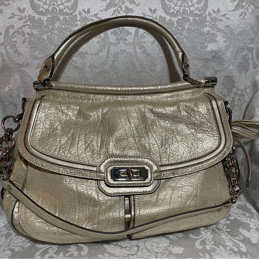 Pewter gold Coach bag.